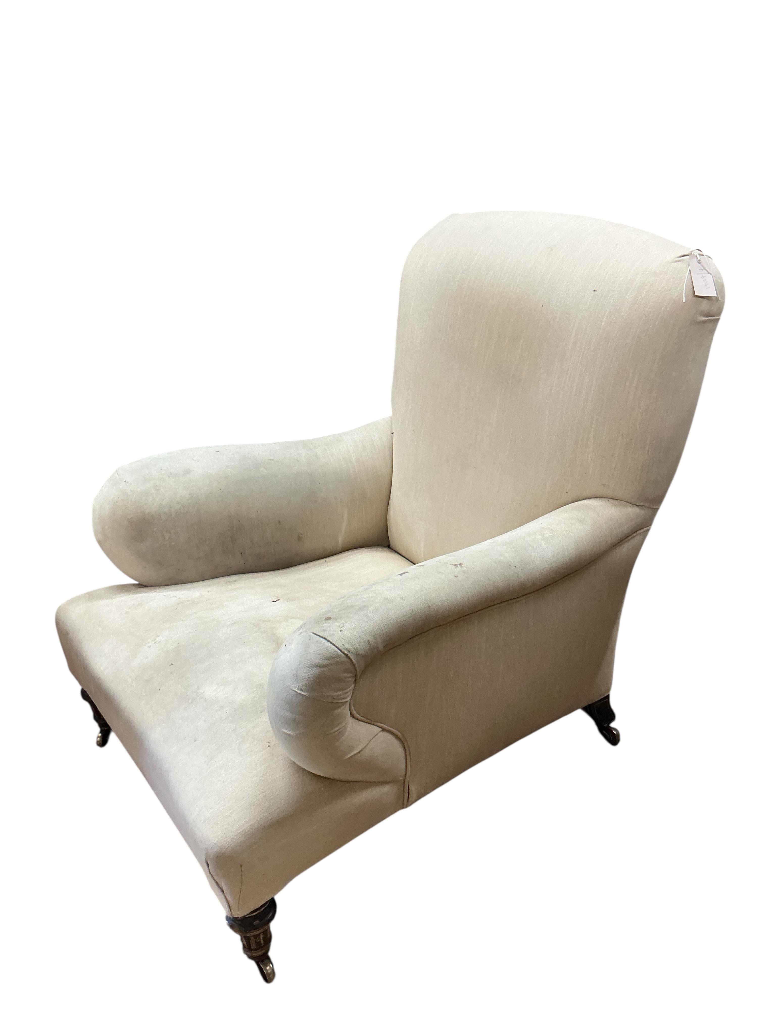 A Victorian Howard style upholstered armchair, width 80cm, depth 80cm, height 88cm